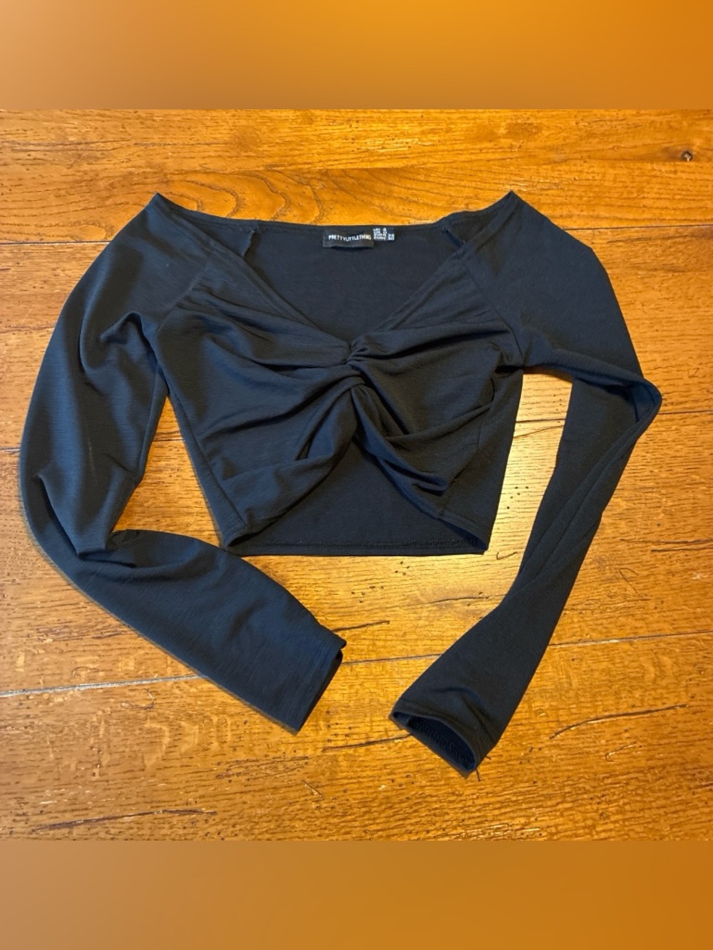 PrettyLittleThing Black Twist-Front Long Sleeve Crop Top